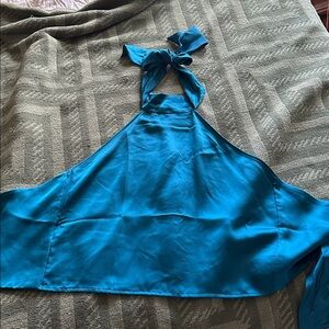 NWOT! Beautiful  wrap top. Toes at neck as well as behind back. medium